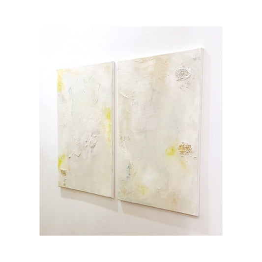 Set of 2 custom large abstract canvas paintings in neutral tones with subtle yellow accents and textured mixed media design.