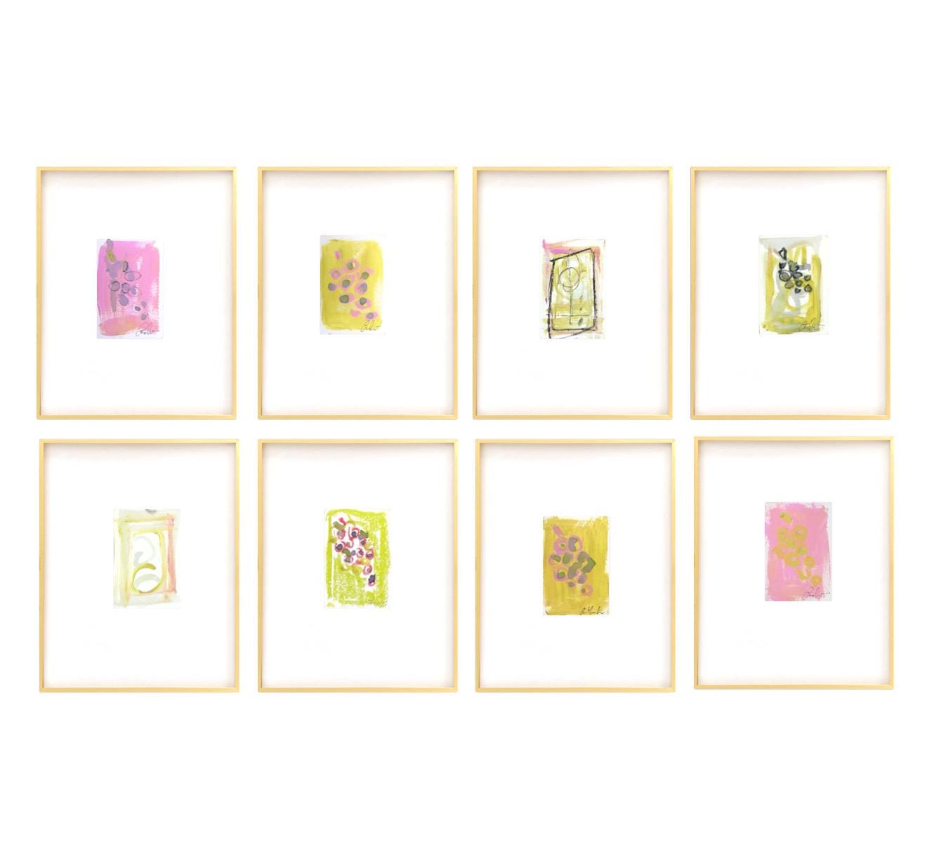 Set of eight original abstract paintings, matted and framed in gold, featuring pastel shades of pink and green.